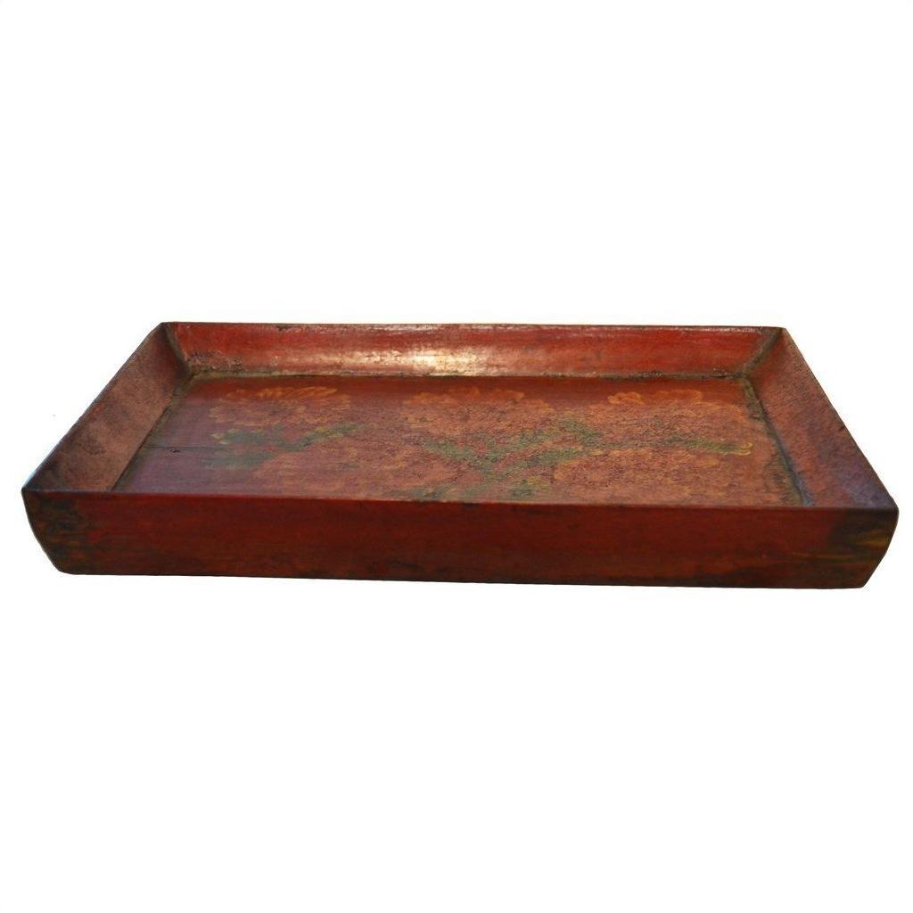 Close-up of a vintage Chinese hand-painted ornate tray, rustic red color with weathered finish and raised edges.