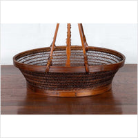 Vintage Chinese Woven Rattan Carrying Basket with Large Tripartite Handle