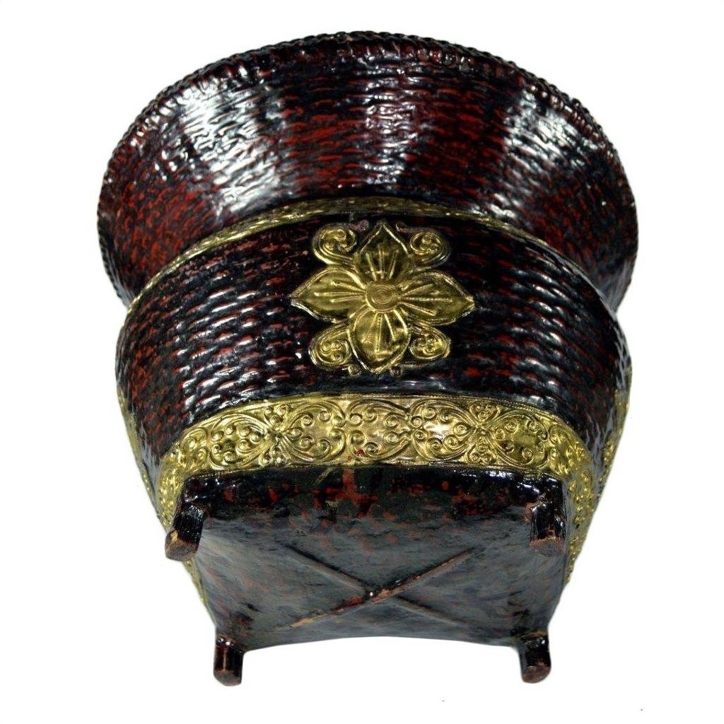 Gold and bamboo offering basket with ornate gilt floral décor, side view.