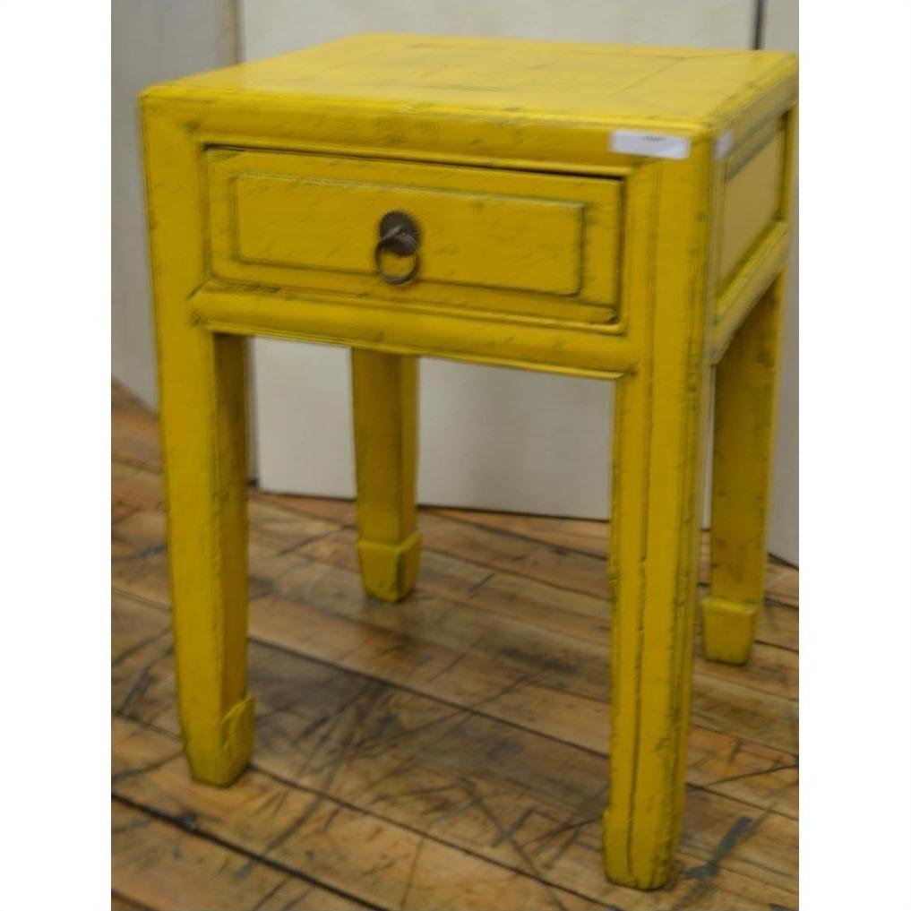 Distressed yellow wood side tables with horse hoof feet and single drawer, shown on a wooden floor.